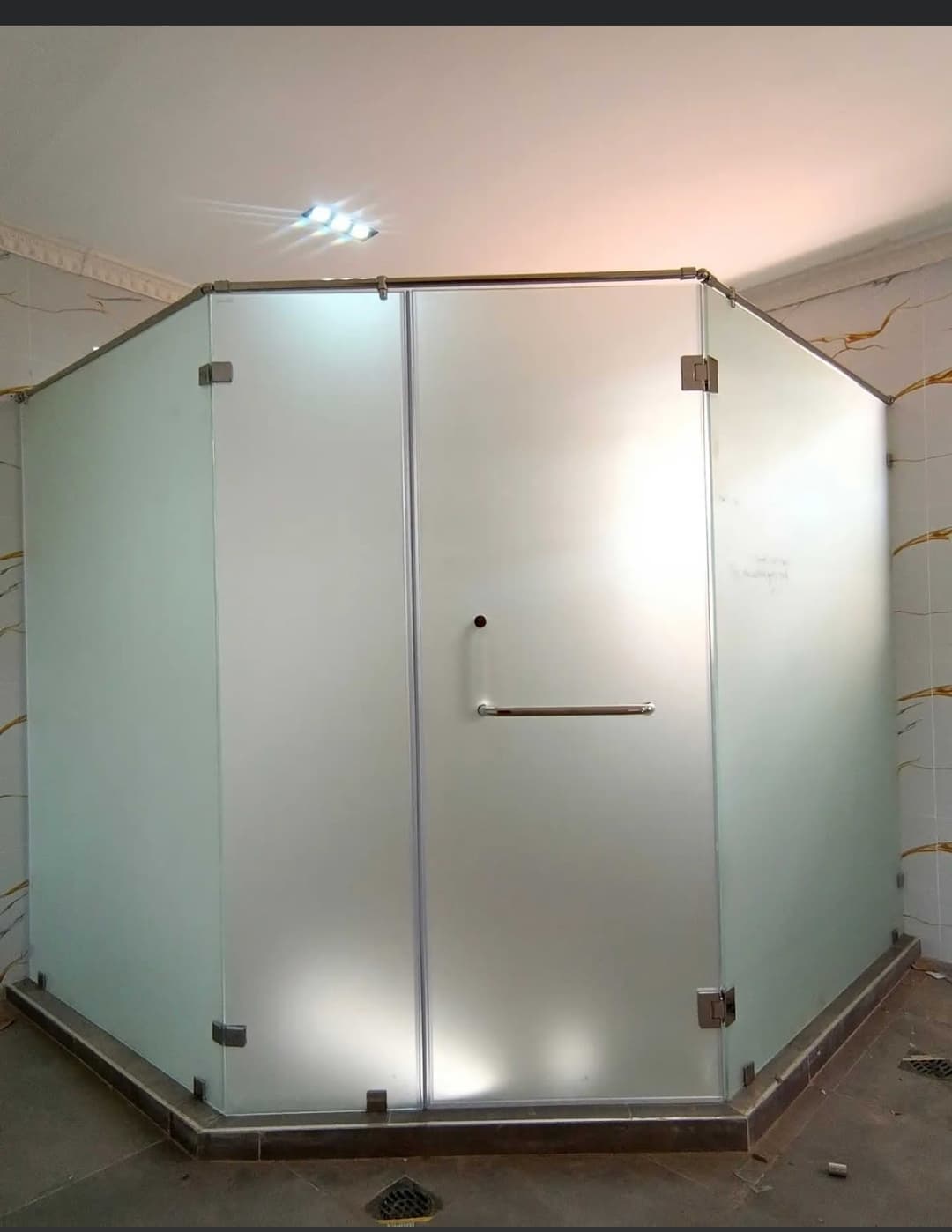 Frosted glass shower cubicle